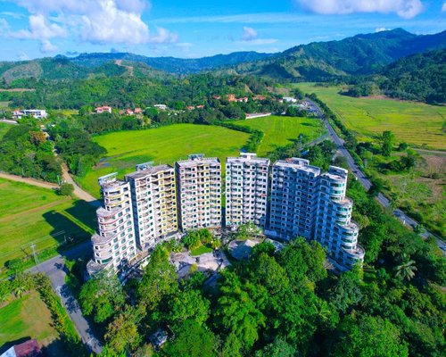 Aerial view of a green landscape surrounding an urban building in Costa Rica